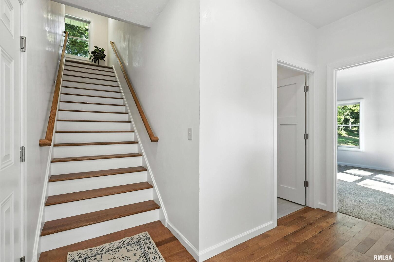 3303 Valley Drive Geneseo, IL 61254 - Photo 15 of 50 a view of a hallway with wooden floor and entryway