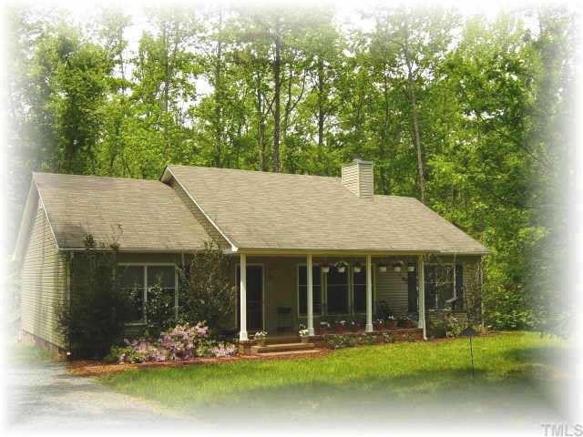 1224 North Frazier Road Mebane, NC 27302 - Photo 1 of 1 Nestled in the woods, pretty 3_2 on 1.93 acres.