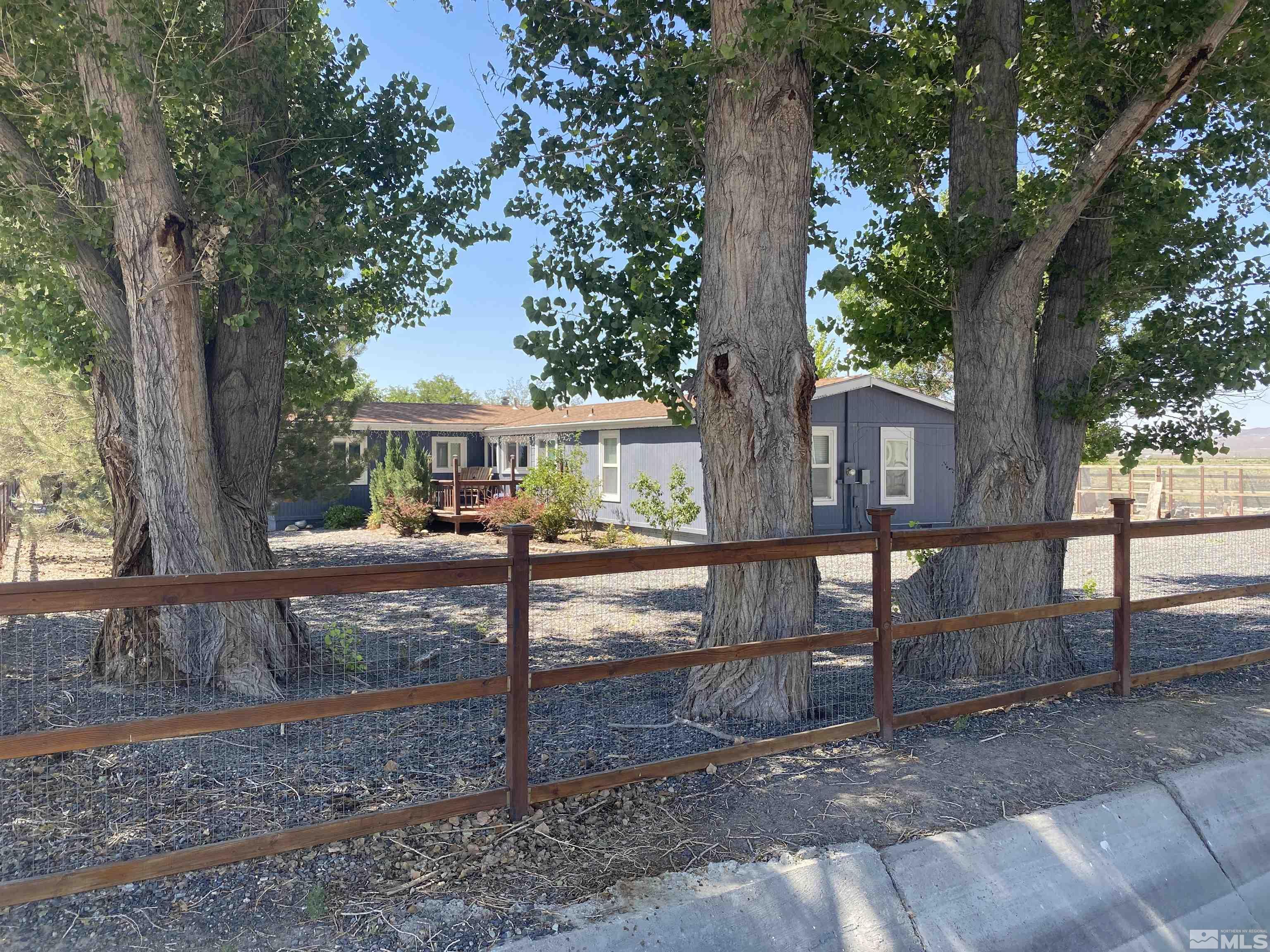 1405 South Meridian Road Lovelock, NV 89419 - Photo 1 of 39 a view of a house with a yard