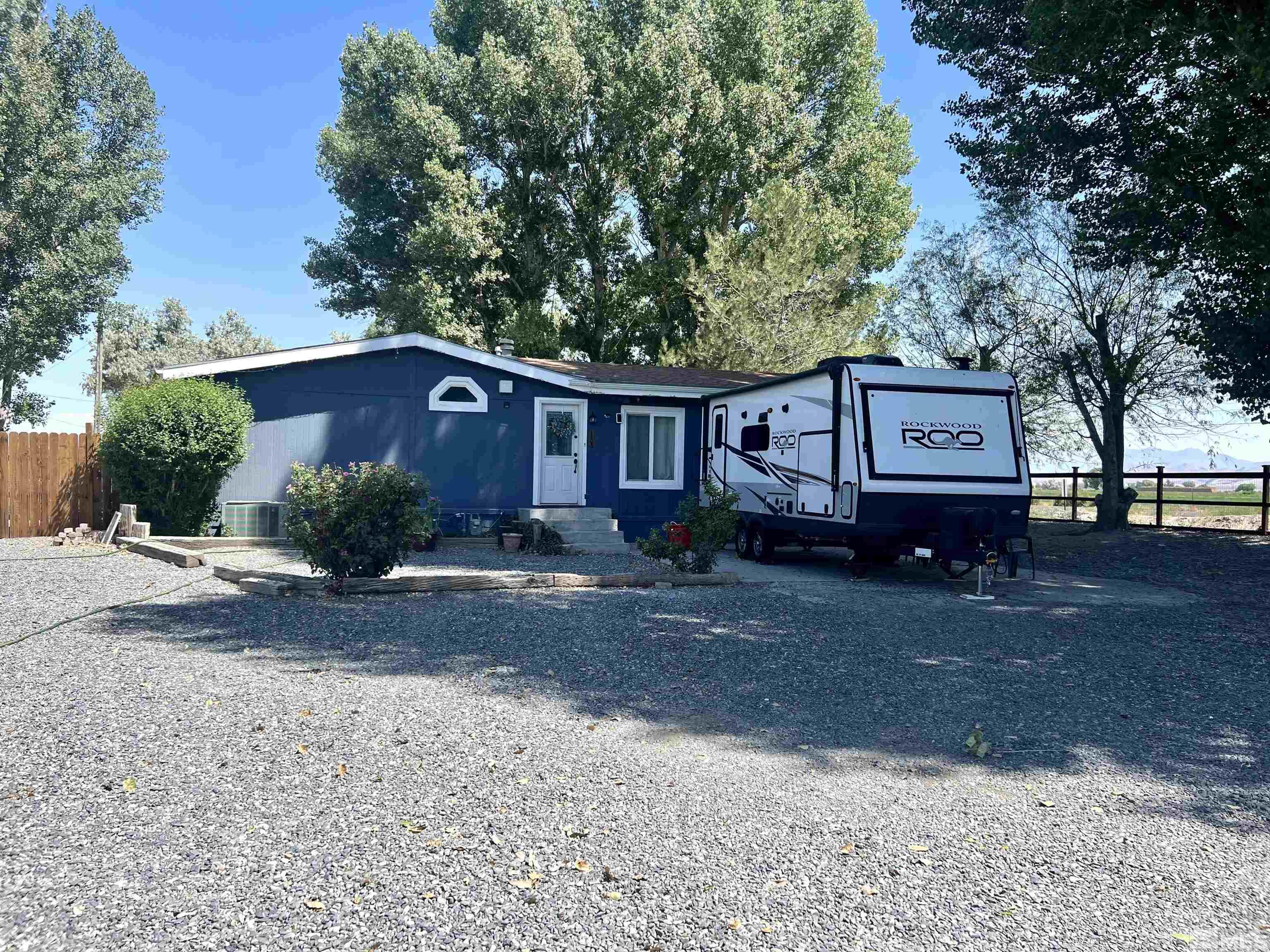 1405 South Meridian Road Lovelock, NV 89419 - Photo 14 of 39 a view of a house with a yard