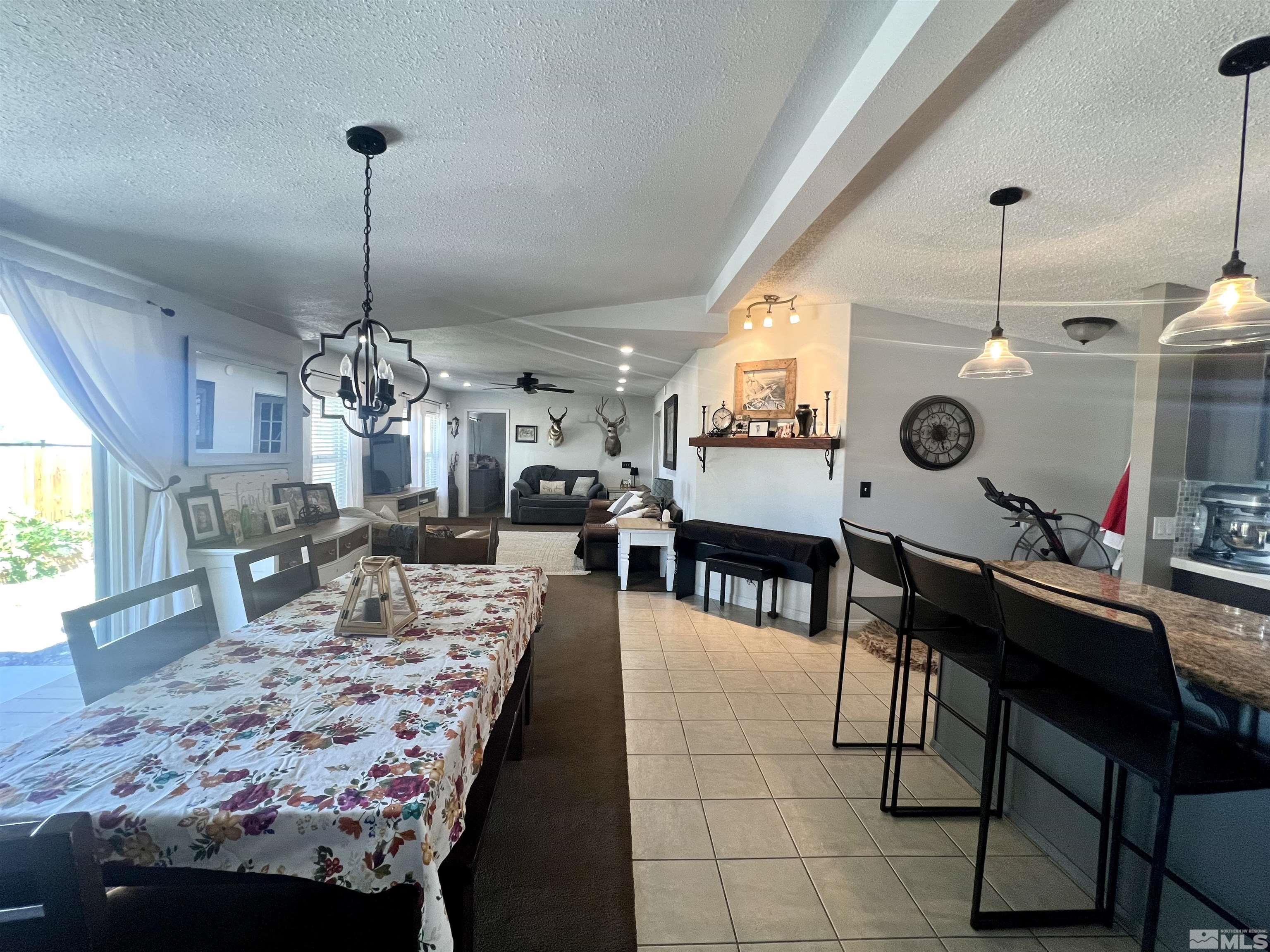 1405 South Meridian Road Lovelock, NV 89419 - Photo 30 of 39 a large kitchen with a table and chairs