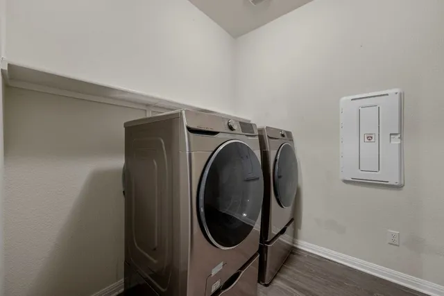 a utility room with dryer and washer