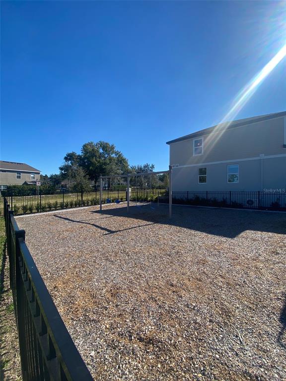 2534 Red Spruce Way Ocoee, FL 34761 - Photo 16 of 16 a view of outdoor space and yard