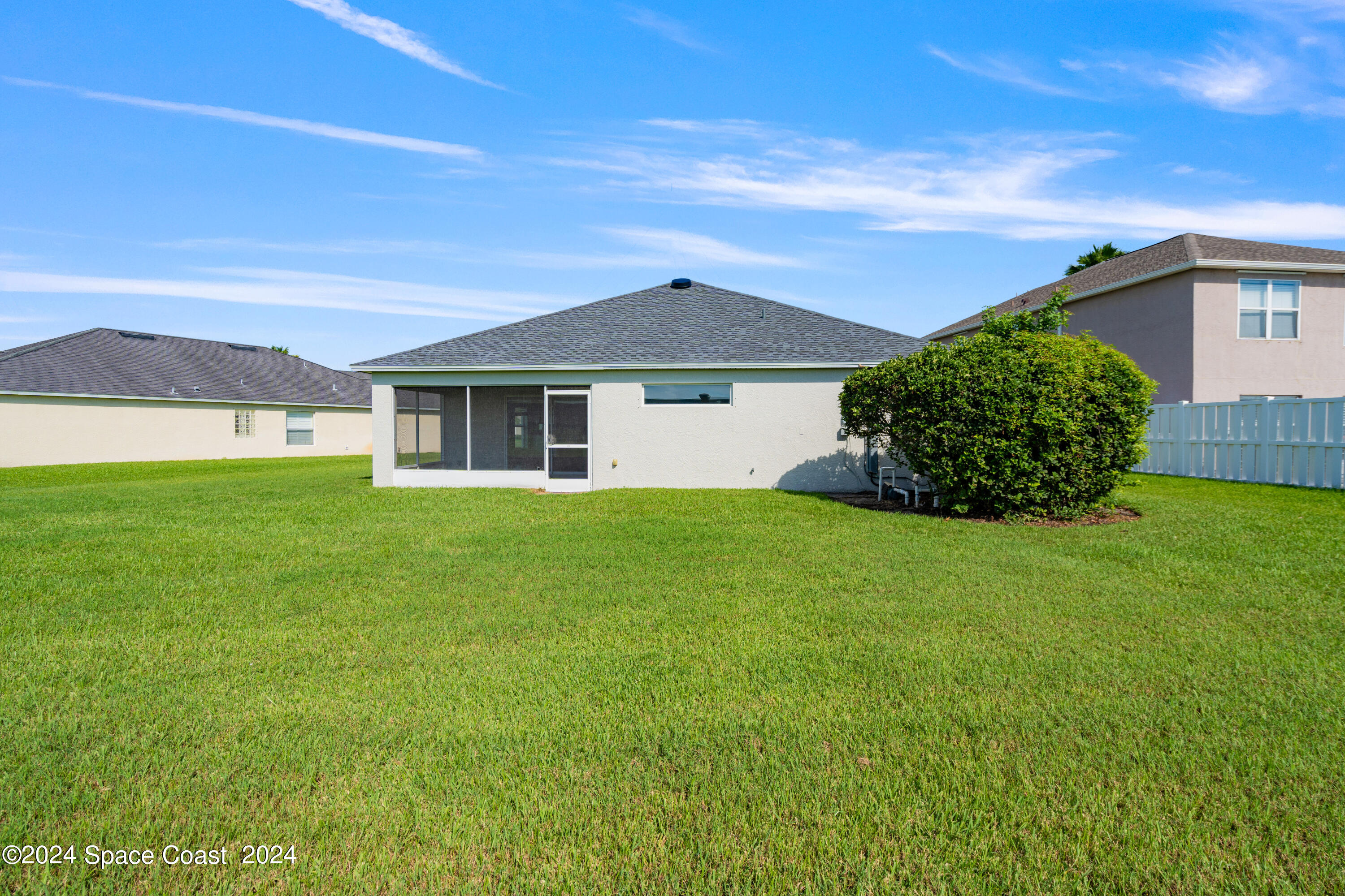 4220 Chardonnay Drive Rockledge, FL 32955 - Photo 22 of 51 a front view of a house with garden