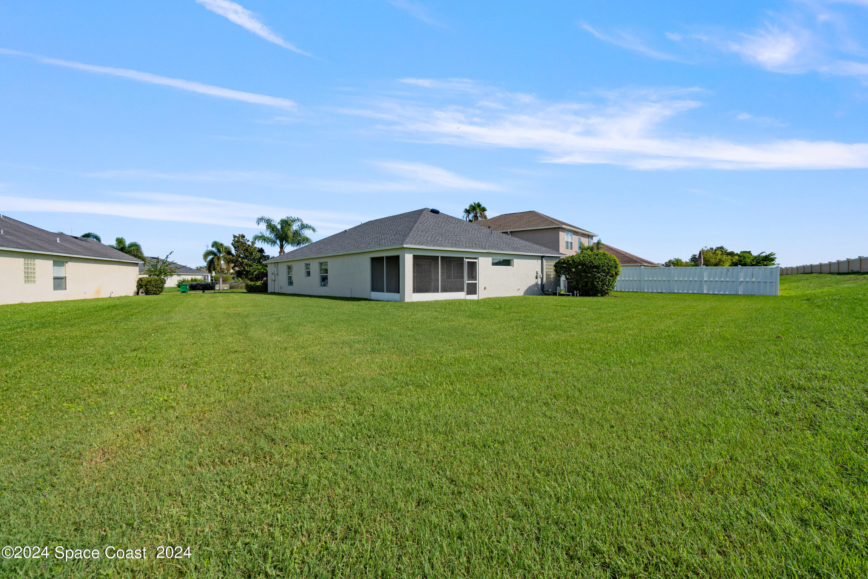 4220 Chardonnay Drive Rockledge, FL 32955 - Photo 23 of 51 a view of a house with a big yard
