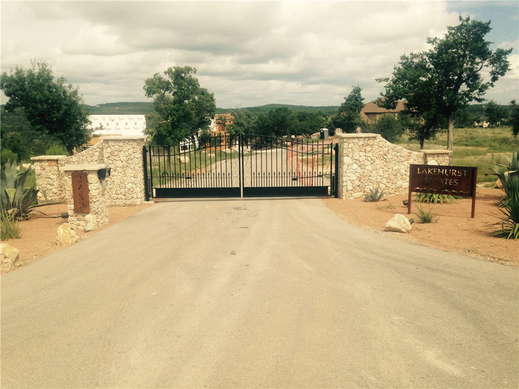 2452 Lakehurst Road, Unit 7 Spicewood, TX 78669 - Photo 1 of 1 Front gate to private drive. Property lies on the right of the private drive at the rear of the development.