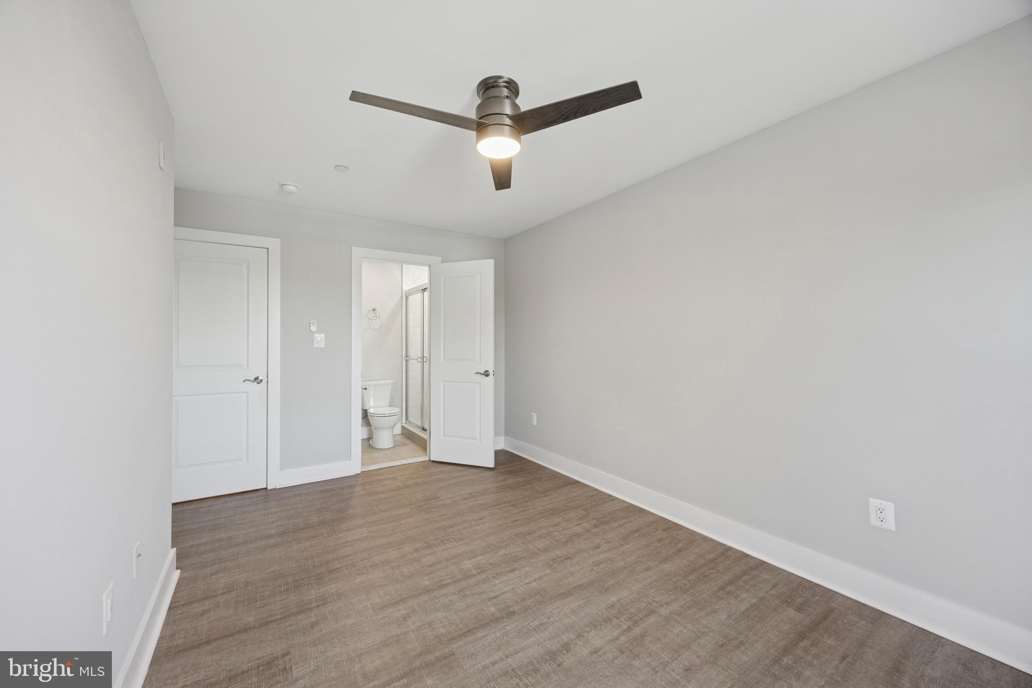 502 Gerhard Street, Unit J Philadelphia, PA 19128 - Photo 23 of 25 wooden floor in an empty room