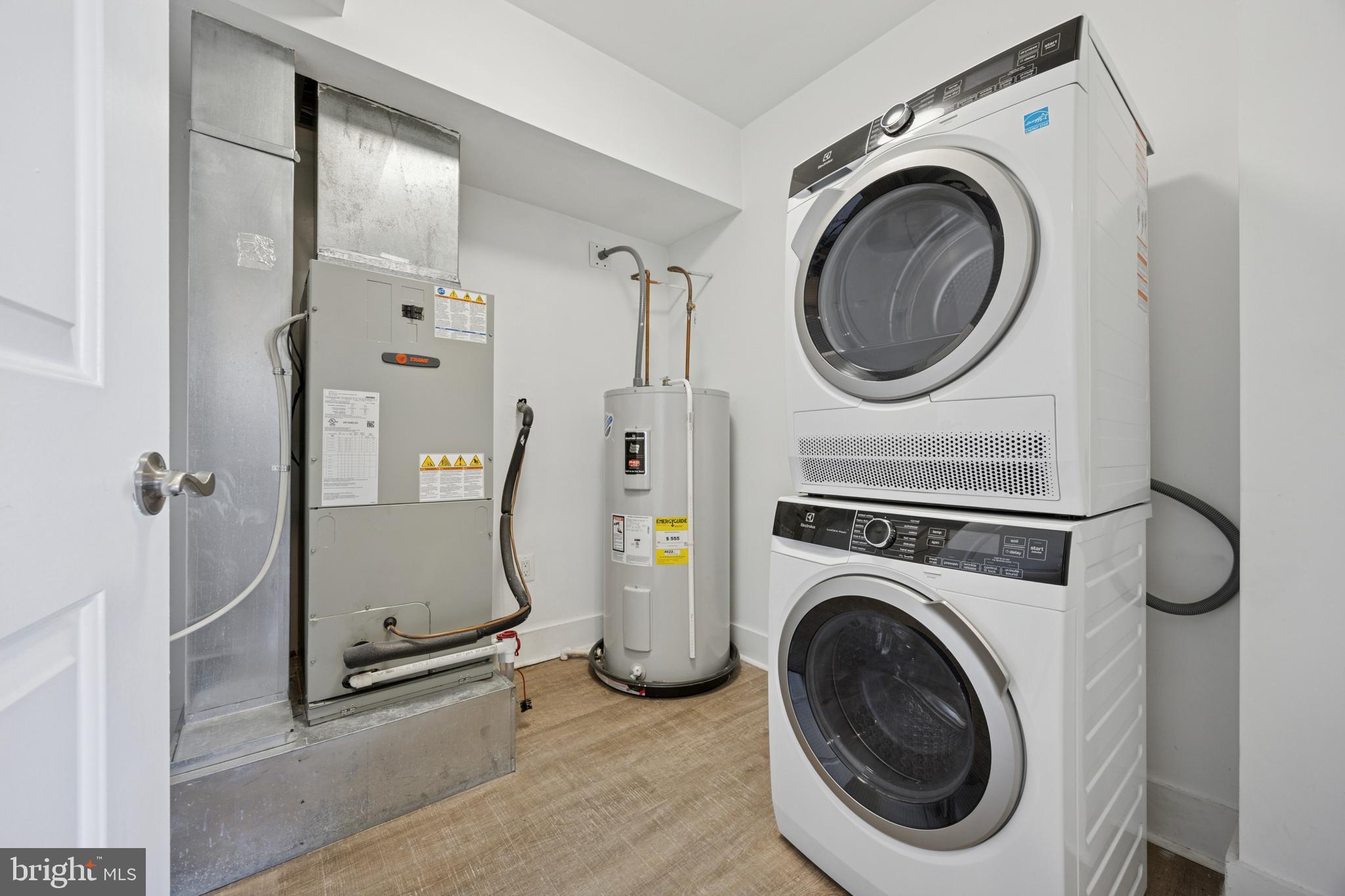 502 Gerhard Street, Unit J Philadelphia, PA 19128 - Photo 25 of 25 a view of a storage & utility room with dryer and washer
