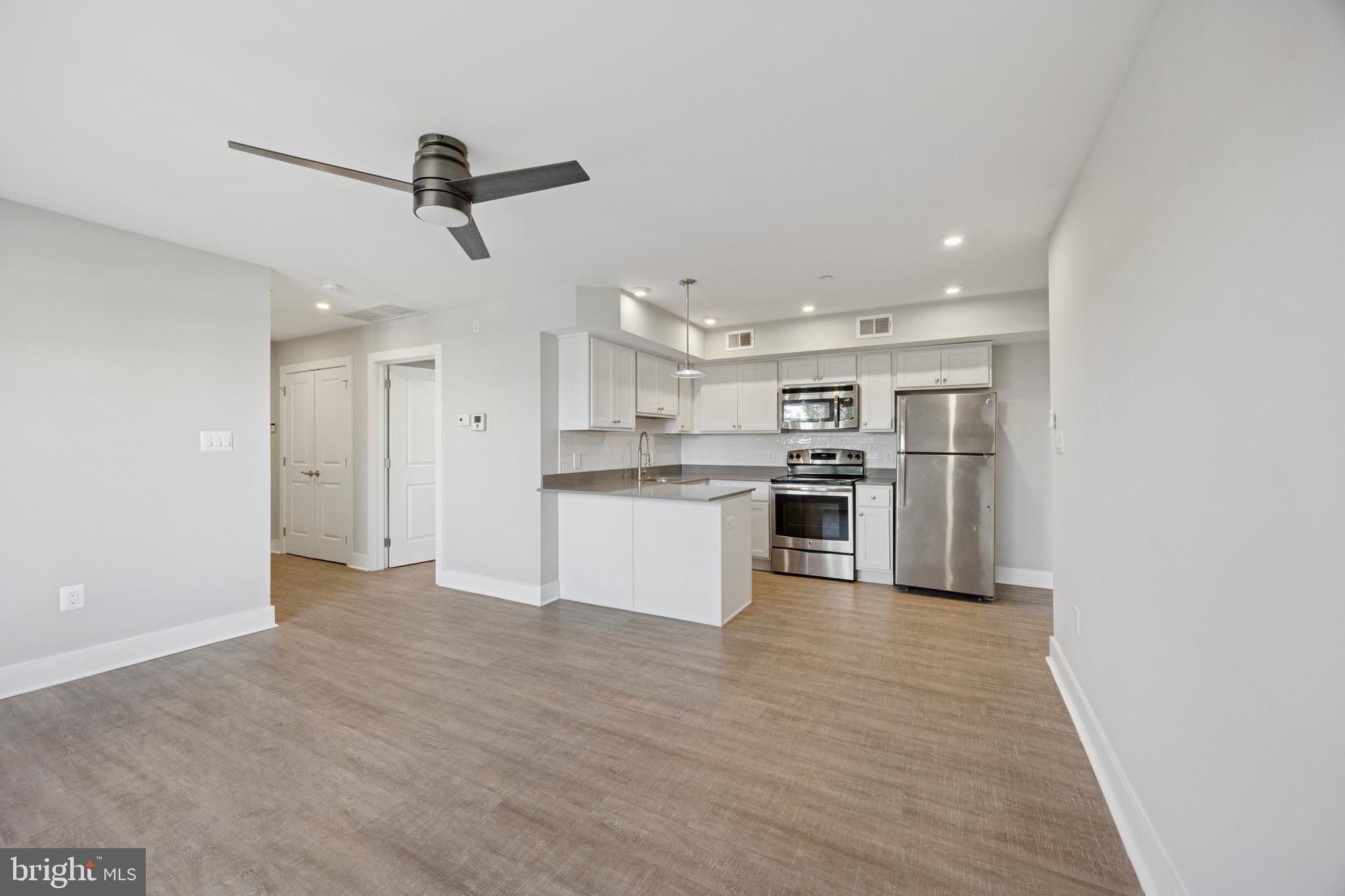 502 Gerhard Street, Unit J Philadelphia, PA 19128 - Photo 6 of 25 a view of kitchen with wooden floor