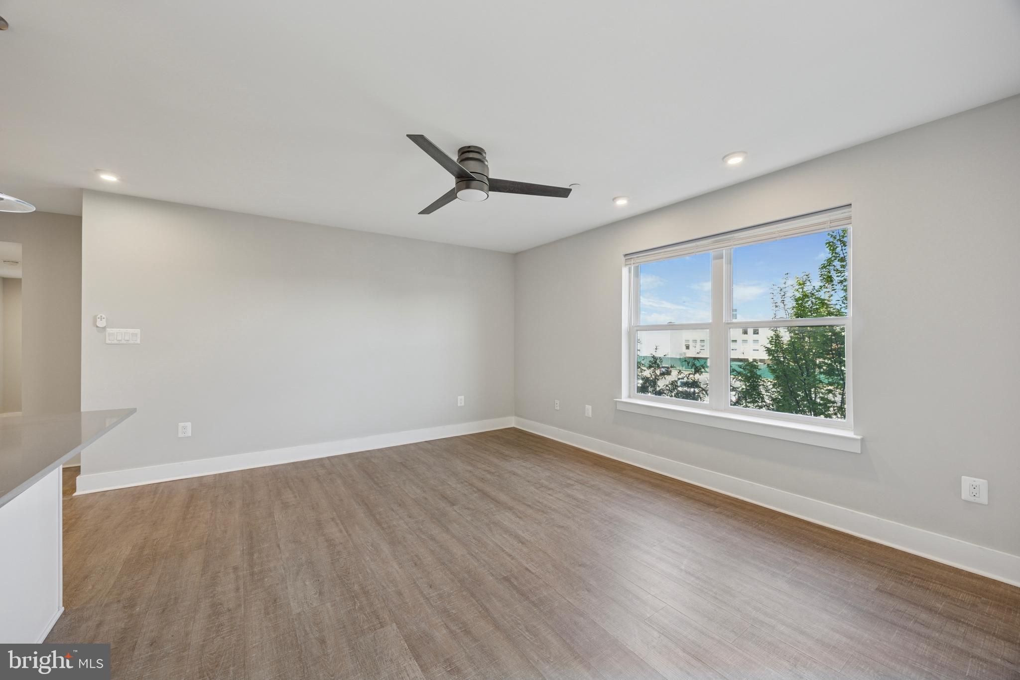 502 Gerhard Street, Unit J Philadelphia, PA 19128 - Photo 8 of 25 wooden floor in an empty room with a window