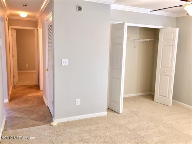 12267 Ridge Forest Lane Jacksonville, FL 32246 - Photo 13 of 16 JR-hallway and 2 bedrooms