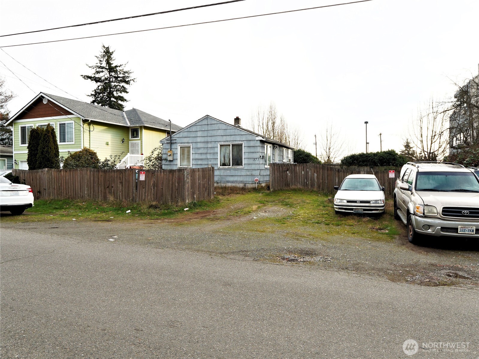 871 Southwest 135th Street Burien, WA 98146 - Photo 14 of 16 a car parked in front of a house