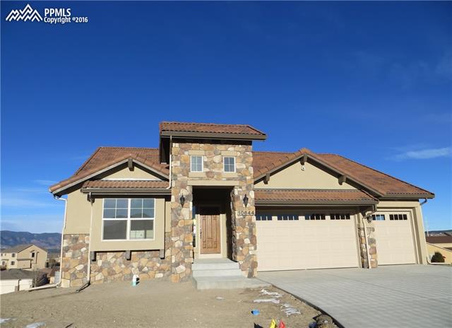 10644 Slumber Ridge Way Colorado Springs, CO 80908 - Photo 1 of 1 Hillingdon-Tuscan Elevation-3 Car Garage-Finished Walk Out Basement with 9' Ceilings-Views-Cul De Sac-Desirable Bison Ridge Community!