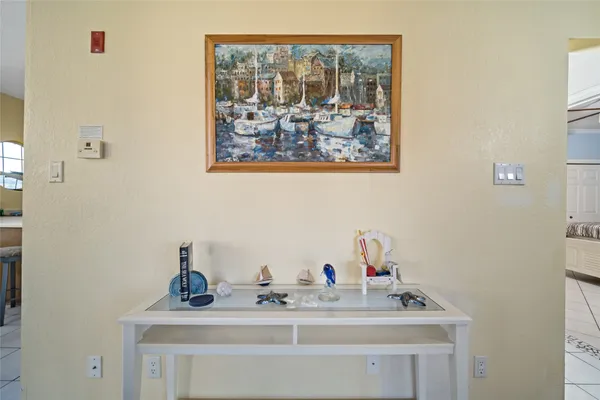 a very nice looking room with many windows and furniture