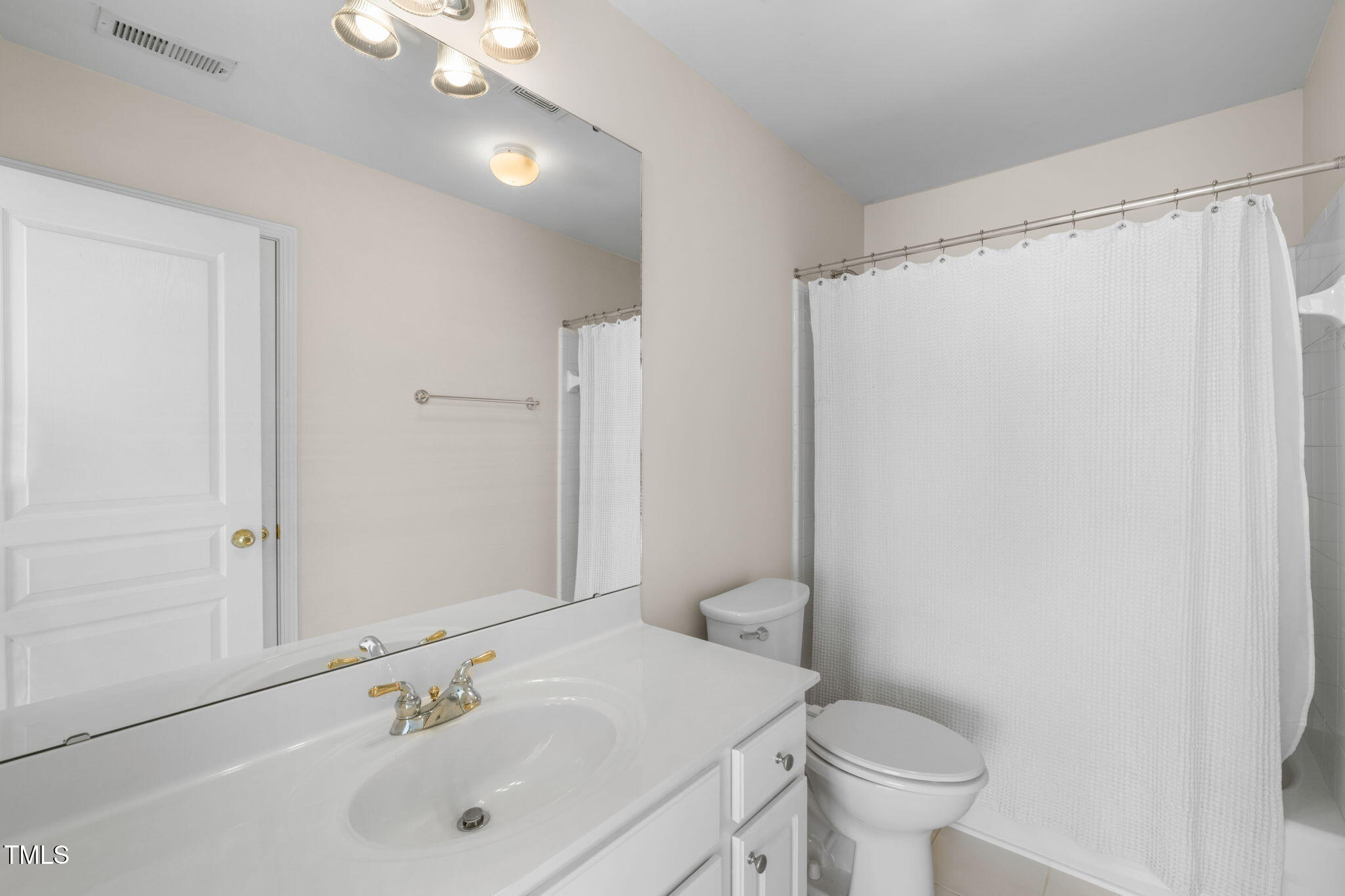 3614 Lion Ridge Court Raleigh, NC 27612 - Photo 42 of 52 Bedroom 3 and Hall bath