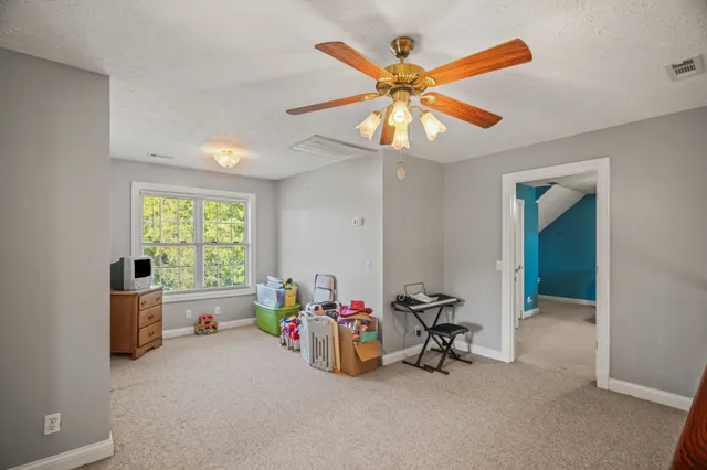a bathroom with a sink vanity and a mirror
