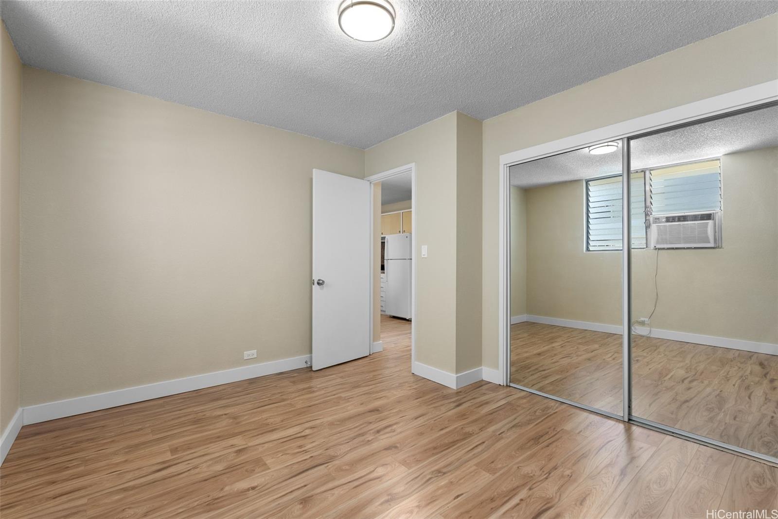 814 Kinau Street, Unit 401 Honolulu, HI 96813 - Photo 15 of 23 wooden floor in an empty room