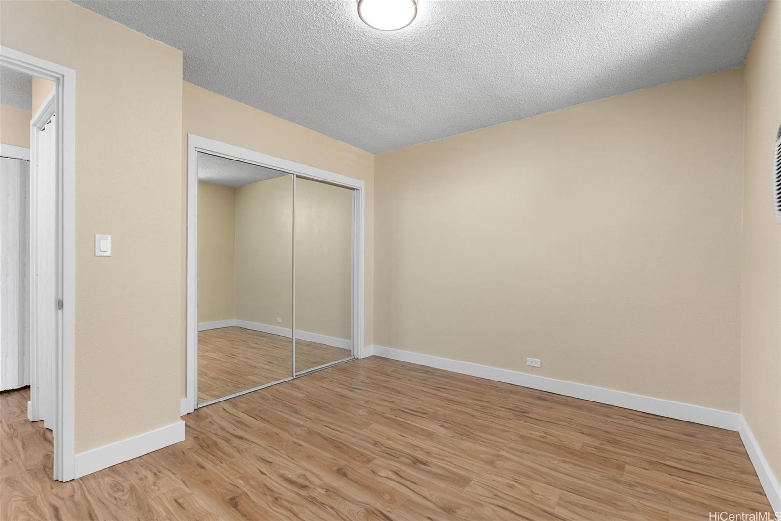 814 Kinau Street, Unit 401 Honolulu, HI 96813 - Photo 17 of 23 wooden floor in an empty room