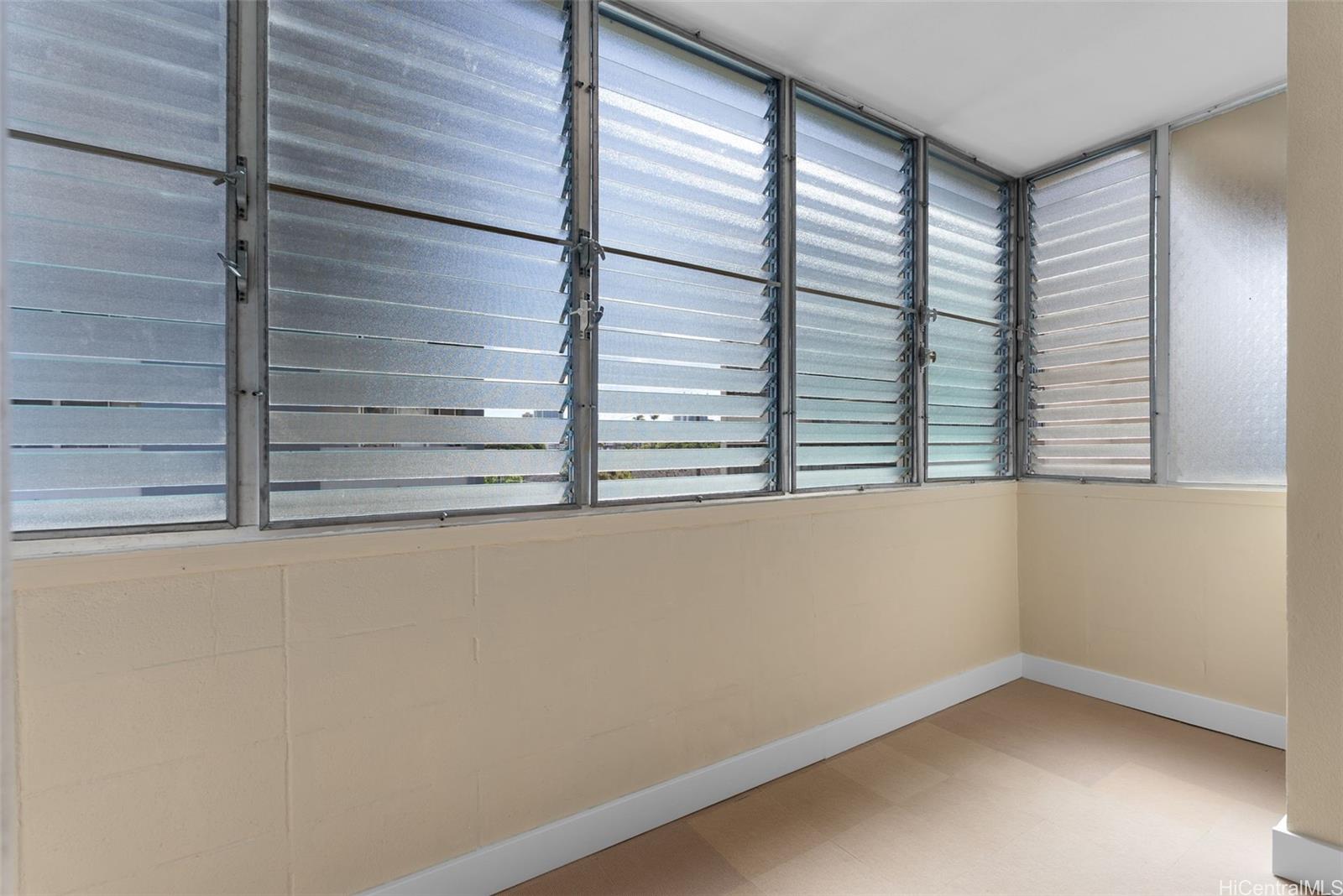 814 Kinau Street, Unit 401 Honolulu, HI 96813 - Photo 9 of 23 a view of a room that has a window in it