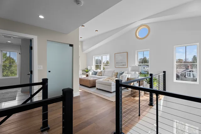 a living room with furniture and a table