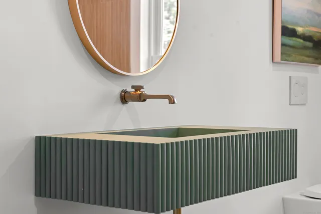 a spacious bedroom with a bed and couch