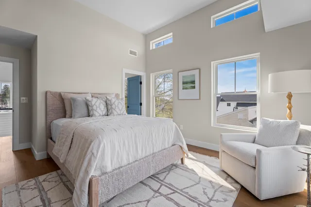 a bedroom with a bed and a view of bedroom