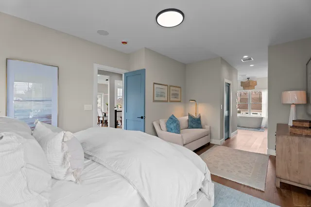 a view of a house with a yard and porch