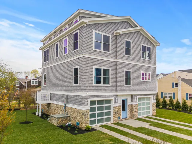 a view of a patio with a dining table and chairs