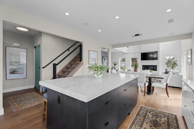 a room with furniture a flat screen tv and a faucet