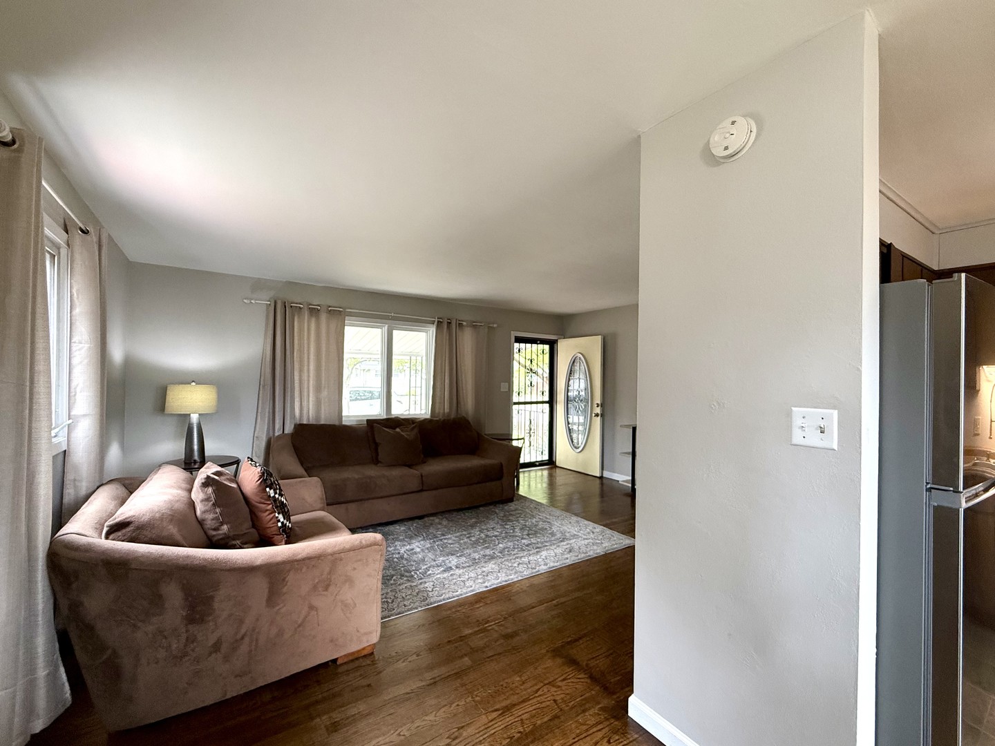509 Broadmeadow Road Rantoul, IL 61866 - Photo 6 of 18 a living room with furniture and a window
