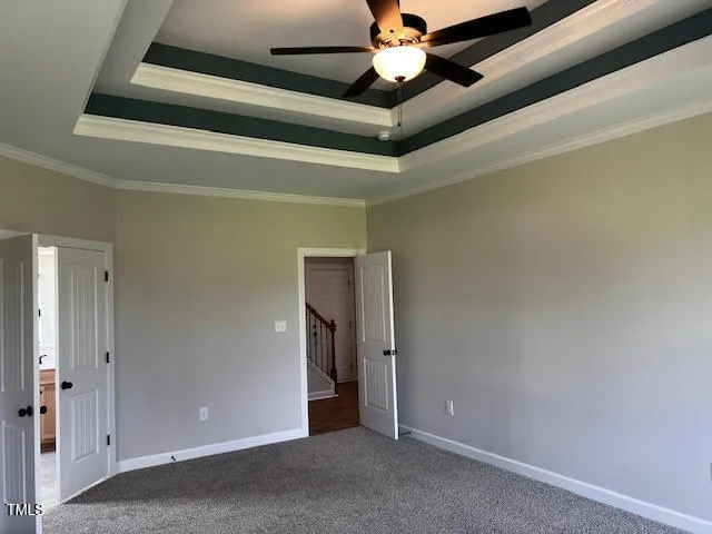 a view of a livingroom with a ceiling fan
