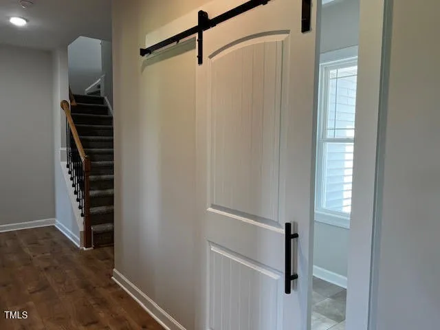 a view of empty room with windows