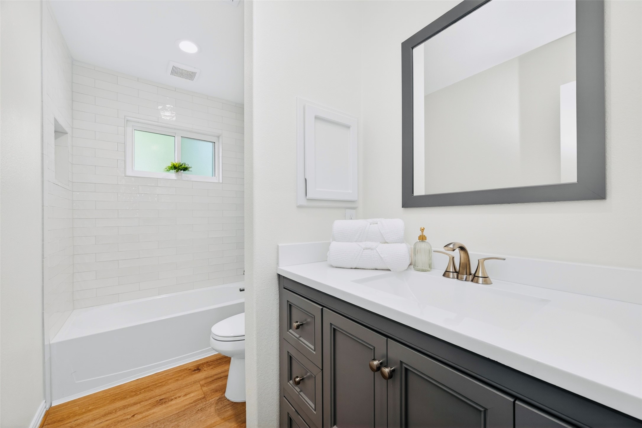 4302 Hickorygate Drive Spring, TX 77373 - Photo 9 of 23 The shared bathroom is fully remodeled