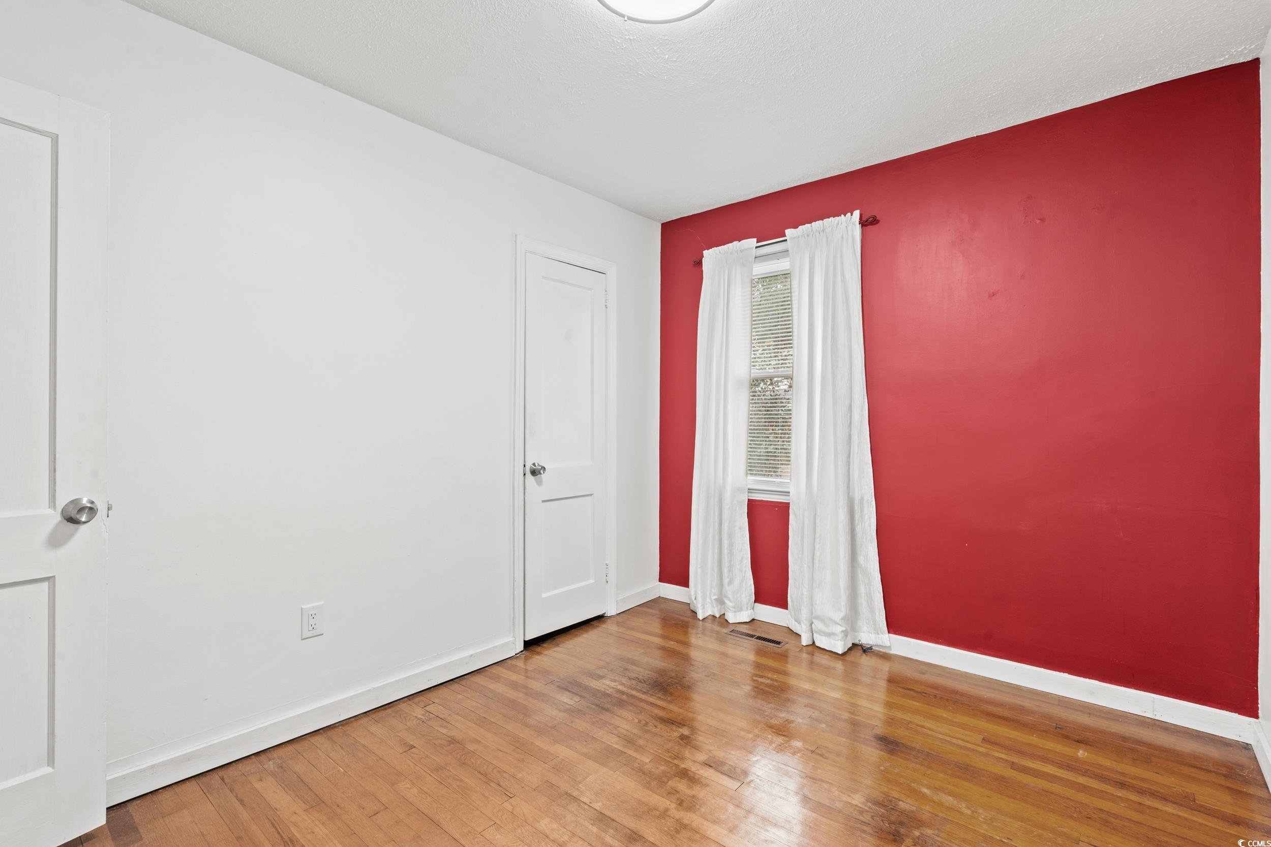 324 Edgewood Circle Conway, SC 29527 - Photo 18 of 31 Unfurnished room featuring light wood-style floors and baseboards