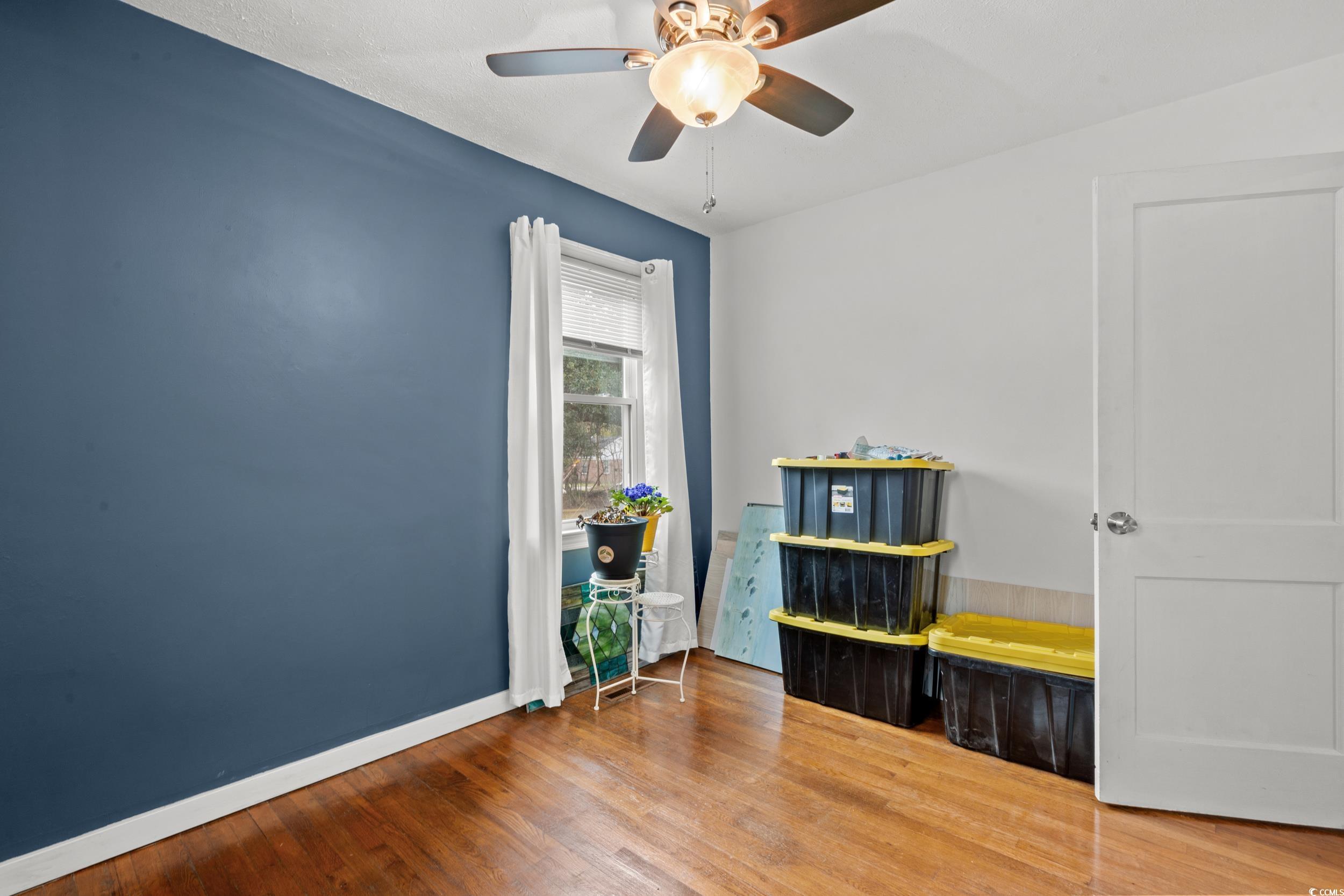 324 Edgewood Circle Conway, SC 29527 - Photo 20 of 31 Spare room featuring hardwood / wood-style flooring and a ceiling fan