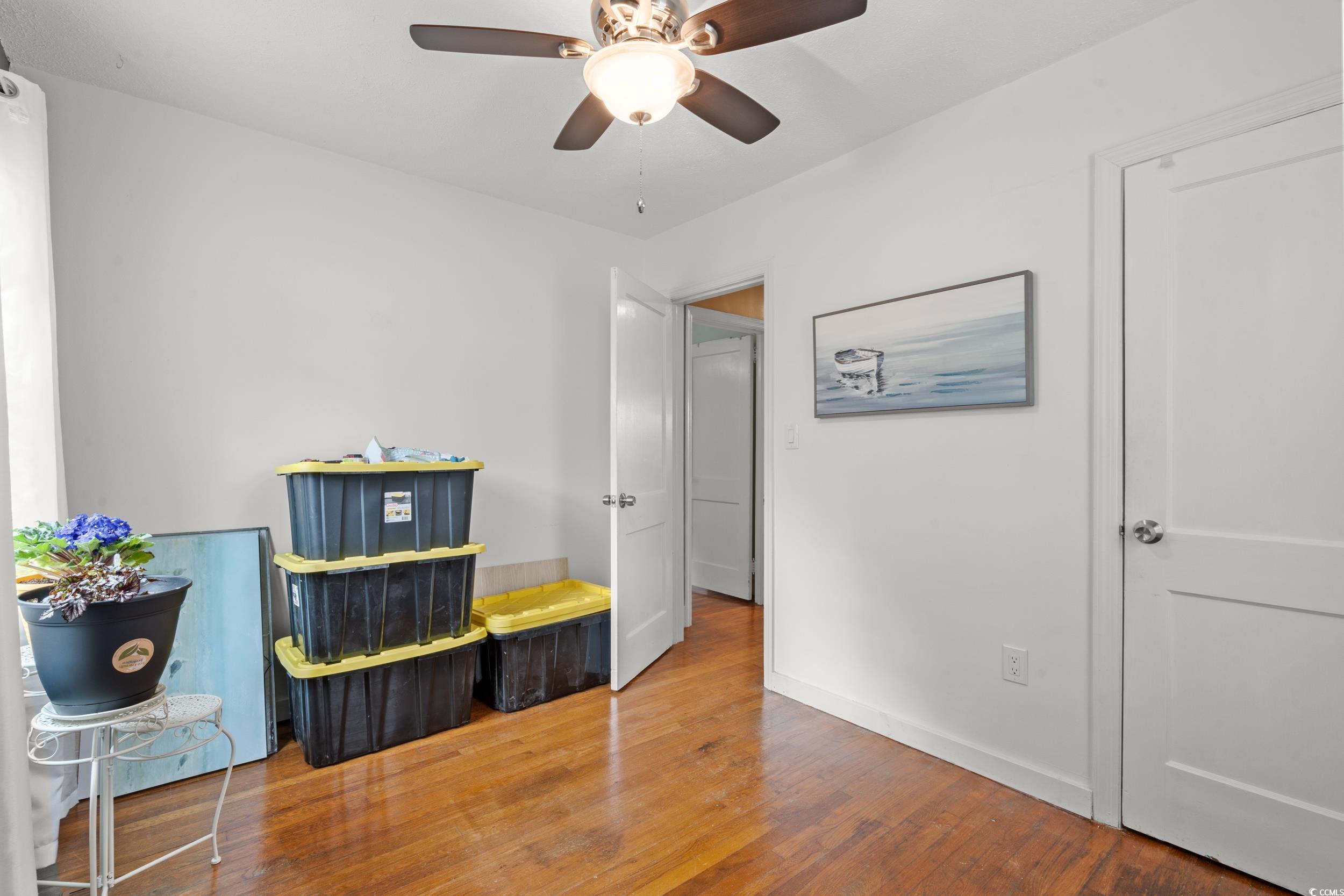 324 Edgewood Circle Conway, SC 29527 - Photo 22 of 31 Bedroom with ceiling fan and wood-type flooring