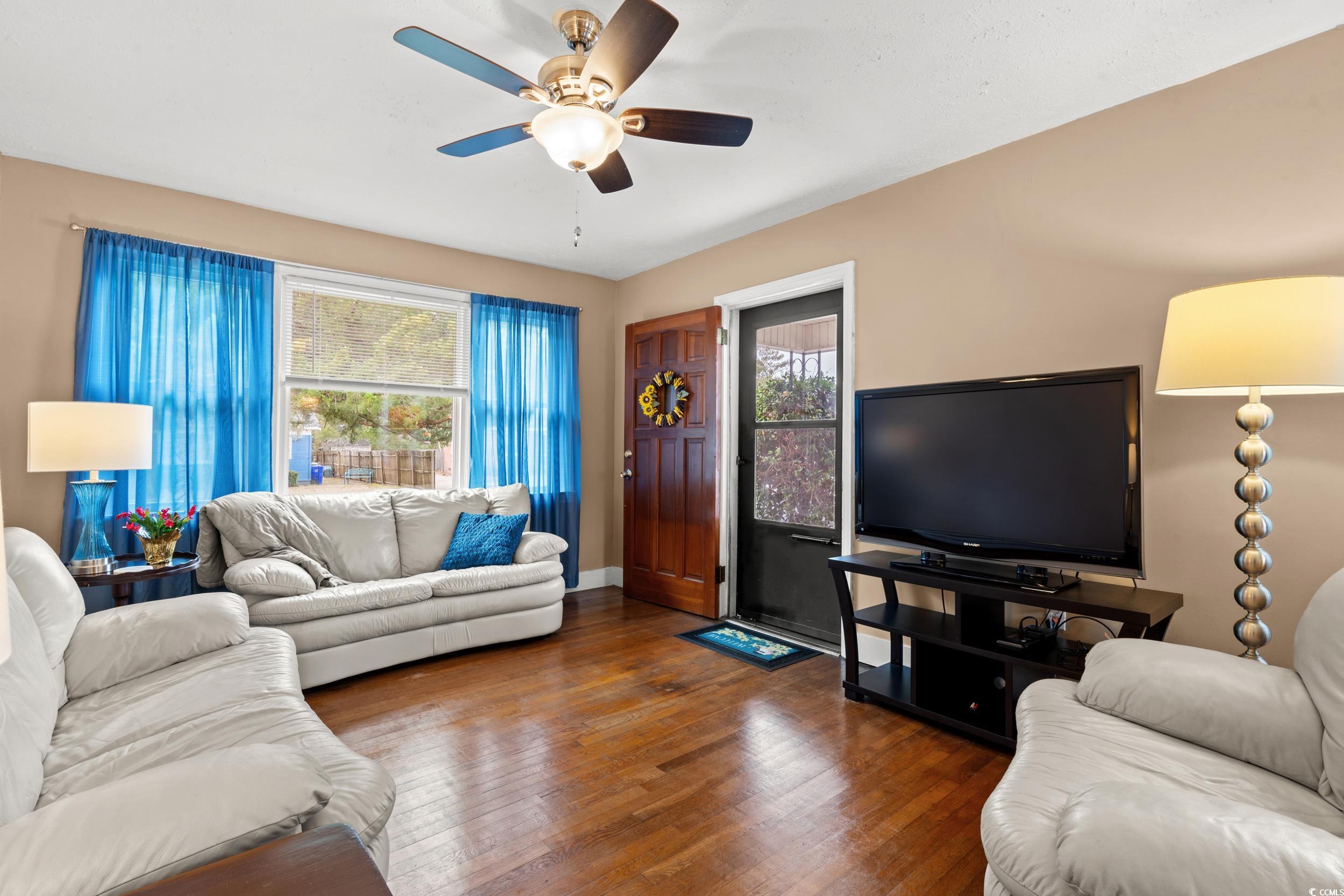 324 Edgewood Circle Conway, SC 29527 - Photo 5 of 31 Living area with wood-type flooring and a ceiling fan