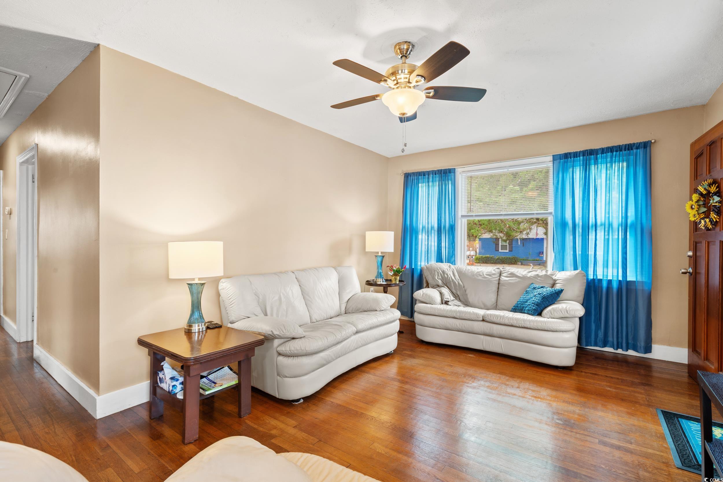 324 Edgewood Circle Conway, SC 29527 - Photo 6 of 31 Living area featuring hardwood / wood-style flooring and attic access