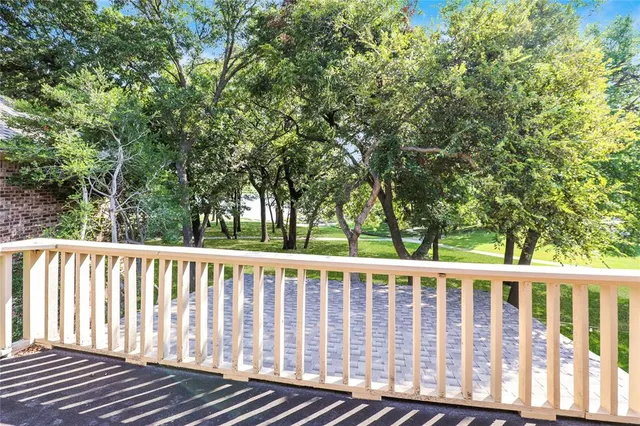a view of a wooden fence