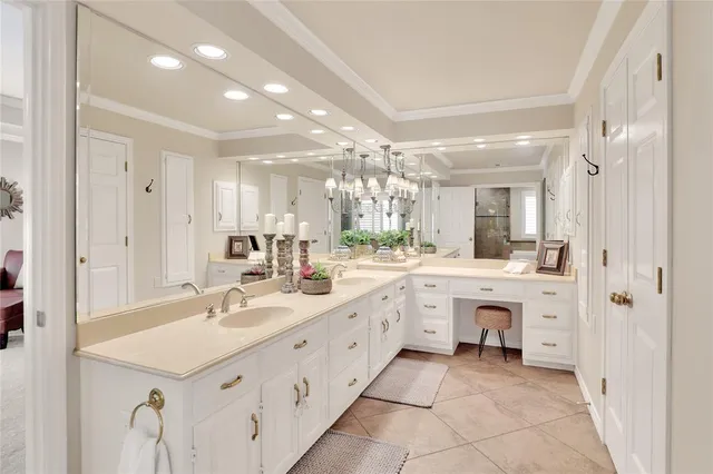 a spacious bathroom with a double vanity sink mirror and