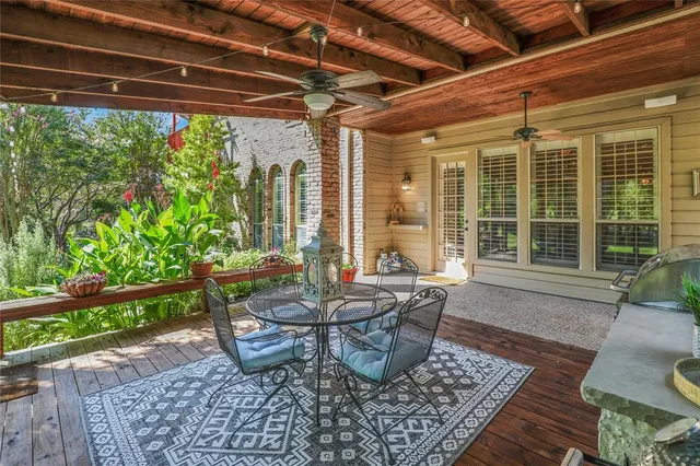 a living room with furniture and a garden