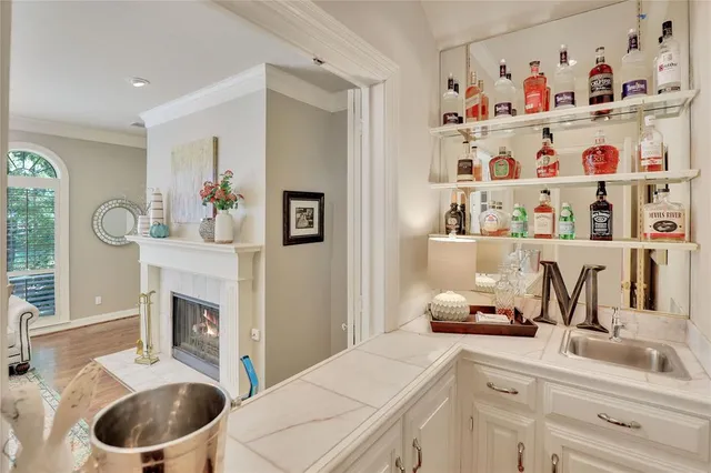a kitchen with a cabinets and a fireplace