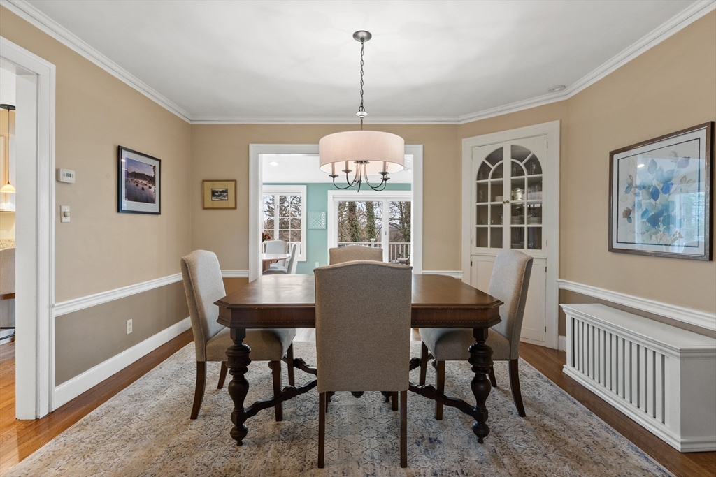 29 Allen Road Winchester, MA 01890 - Photo 11 of 42 a dining room with furniture a chandelier and window