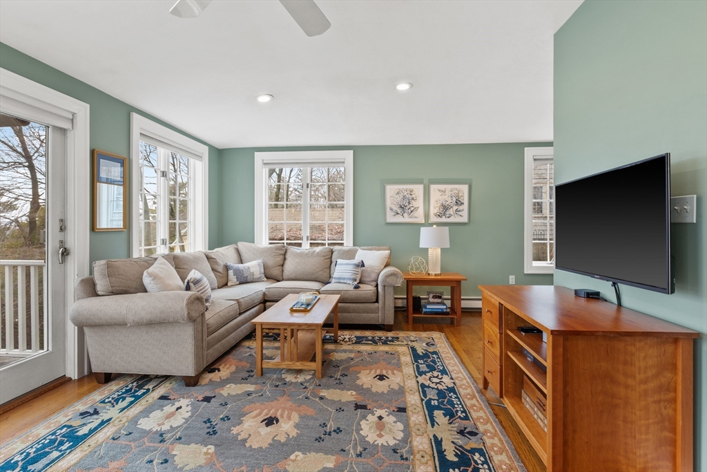 29 Allen Road Winchester, MA 01890 - Photo 20 of 42 a living room with furniture and a flat screen tv