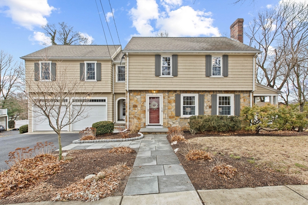 29 Allen Road Winchester, MA 01890 - Photo 2 of 42 a front view of a house with garden