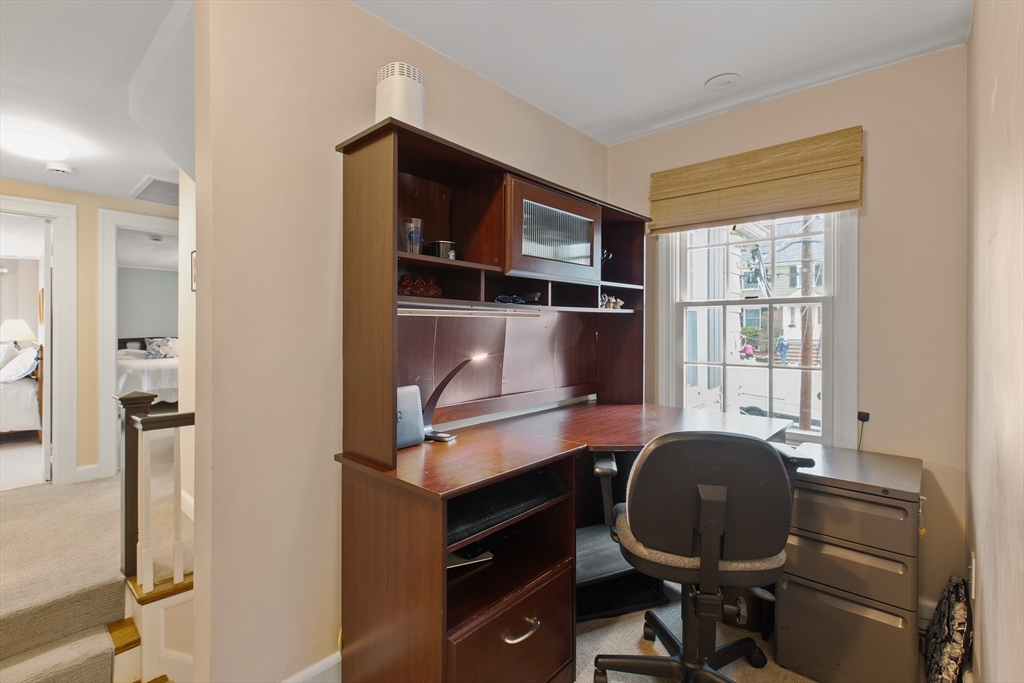 29 Allen Road Winchester, MA 01890 - Photo 29 of 42 a room with chair and window