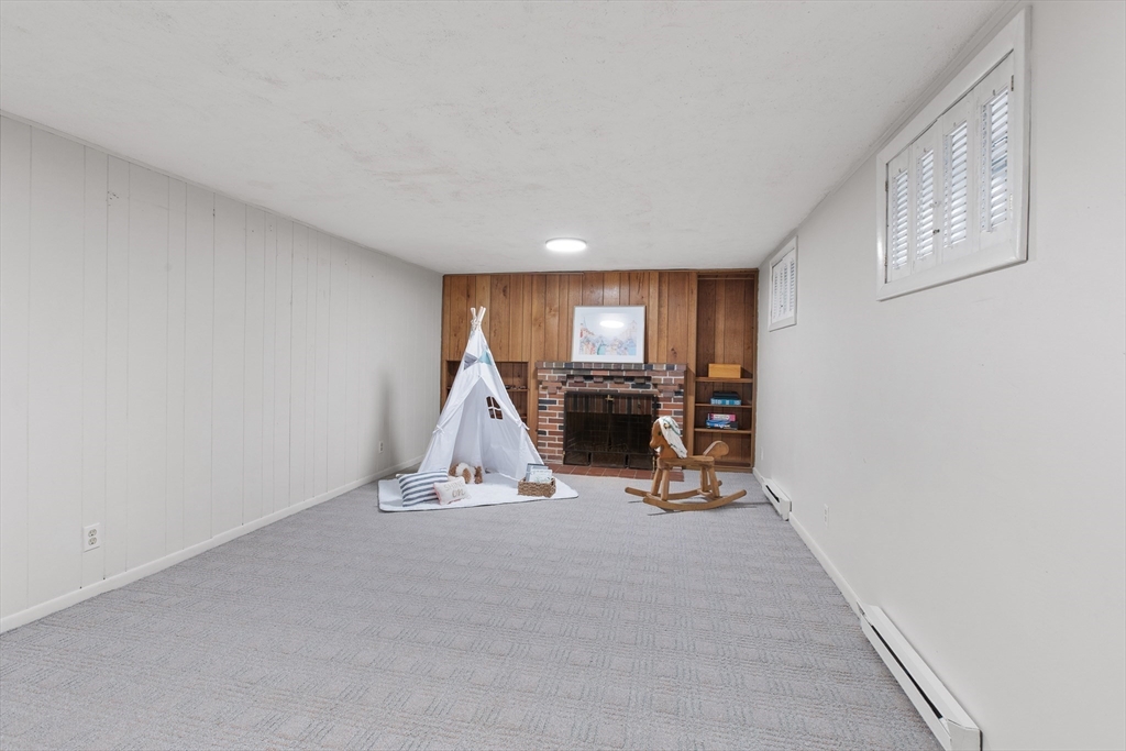 29 Allen Road Winchester, MA 01890 - Photo 37 of 42 a view of a room with gym equipment