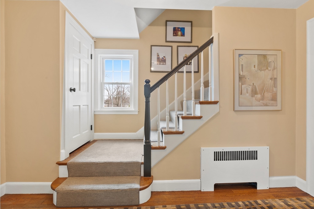 29 Allen Road Winchester, MA 01890 - Photo 7 of 42 a view of entryway and hall with wooden floor