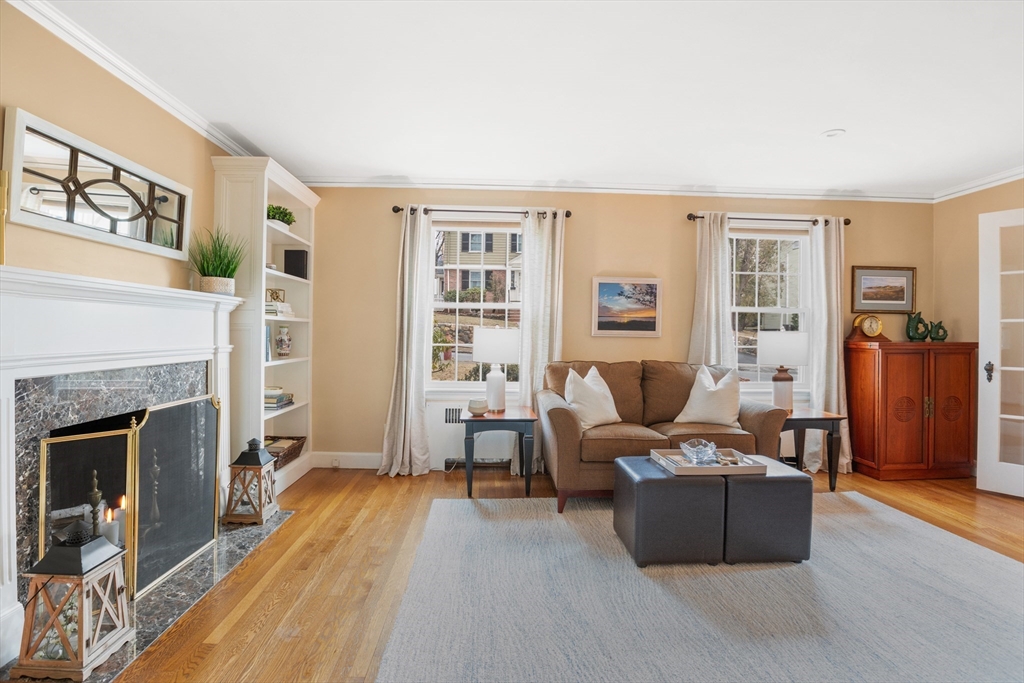 29 Allen Road Winchester, MA 01890 - Photo 10 of 42 a living room with furniture and a fireplace
