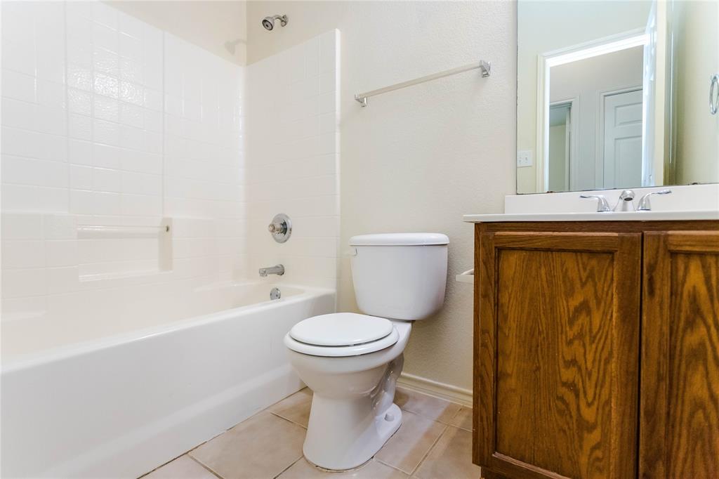 436 Blake Lane Midlothian, TX 76065 - Photo 20 of 26 a bathroom with a sink and a toilet